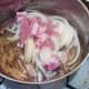 Preparing to saute onion and bacon