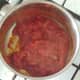 Tomato sauce is simmered until lush and thick