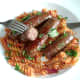 Tucking in to venison sausages and fusilli pasta
