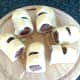 Sausage rolls are halved to serve