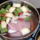 Ham water is brought to a simmer