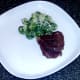 Plated ox cheeks and sprouts in blue cheese