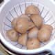 Drained boiled potatoes