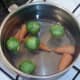 Sprouts are added to simmering carrots