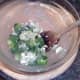 Stiriing sprouts in blue cheese