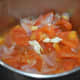 Step six: Once cold, grind tomato mix to get a smooth puree. Strain to remove the fiber in it.