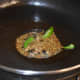 Step two: Heat ghee/oil in a deep-bottomed pan. Saute cumin seeds, green chilies, and peppercorns. Let cumin sizzle.