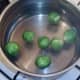 Sprouts are brought to a simmer in salted water