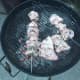 skewered chicken on the grill