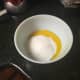 First, mix together the 6 egg yolks and 1 cup of sugar.