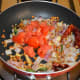 Add chopped tomatoes. Sauté until they become somewhat mushy. Now, turn off the heat.