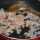 Step two: Add chopped onions. Saute until they get brownish.