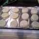 Step Fifteen: Lay all of your biscuits out on your tray about an inch apart.