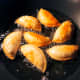 Fry the curry puffs with a generous amount of oil to make sure they cook evenly.
