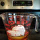 Heat your coconut oil and honey together in the microwave, and then mix then into your water.