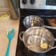 Melt butter into a small saute pan and a large pot.