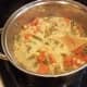 Mix everything together. Cover, turn the temperature to low and simmer while you make your biscuits.