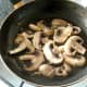 Mushrooms and garlic are briefly fried in ostrich juices