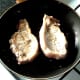 Pork fillets are turned when half way through cooking