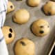 Transfer the balls onto a parchment paper.