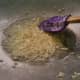 Add oil to a pot over medium heat. Add garlic and fry until it releases its scent.