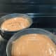 Pour the batter into two 8-inch round baking pans.