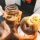 Delicious sugar donut with iced coffee.