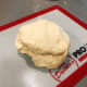 Transfer the dough onto a baking mat. 