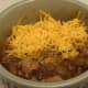 Chipotle Cherry Chili served topped with cheese