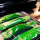 Brush some oil over the banana leaves before grilling them in a pan or a griddle. 