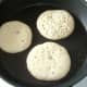 Pancake batter is starting to bubble