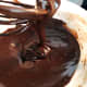Make the chocolate glaze by using the double boiler technique.
