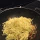 Add the yellow noodles.