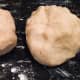 After blending the dough by hand, split it into 2 or 3 balls. I prefer 2.