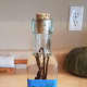 Cork your bottle and add a label stating the month and year. To begin with, all of your bottles with have the same date on them. That's okay.