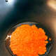 Saute the paste in the wok until it is fragrant.