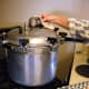 . . .then wait 7-10 minutes to place the weight on for 10 lbs. pressure. Waiting ensures the canner is properly pressurized.