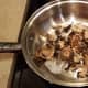 Add your mushrooms and saute for a few minutes, stirring well to coat them all in oil and cook them evenly.