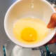 In a pitcher, combine the milk and egg.