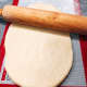 Roll the dough so that it is about 1 inch thick.