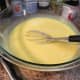 After you mix in the sweetened condensed milk, the mixture becomes thick and a pale yellow.