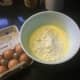 Step 2: In a separate, smaller bowl, beat together the eggs and the yogurt. Blend in the confectioner's sugar and butter mixture.