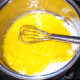 Either whisk carefully into a doughy mass, or add milk a bit at a time, until everything is properly blended.