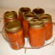 Place in a canner rack or place each in the canner with a jar lifter.