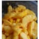 Cut around pit and separate the wedges from the pit. Discard the pit.