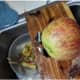 push apple up to cutter