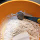 Add baking powder to the mixture. 