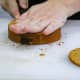 Slicing the cake into 2 for the layers of the shortcake (Step 12).