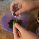 Separate green and brown M&M's into a bowl.