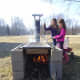Moving the sap from pan to pan to help the evaporation process along.